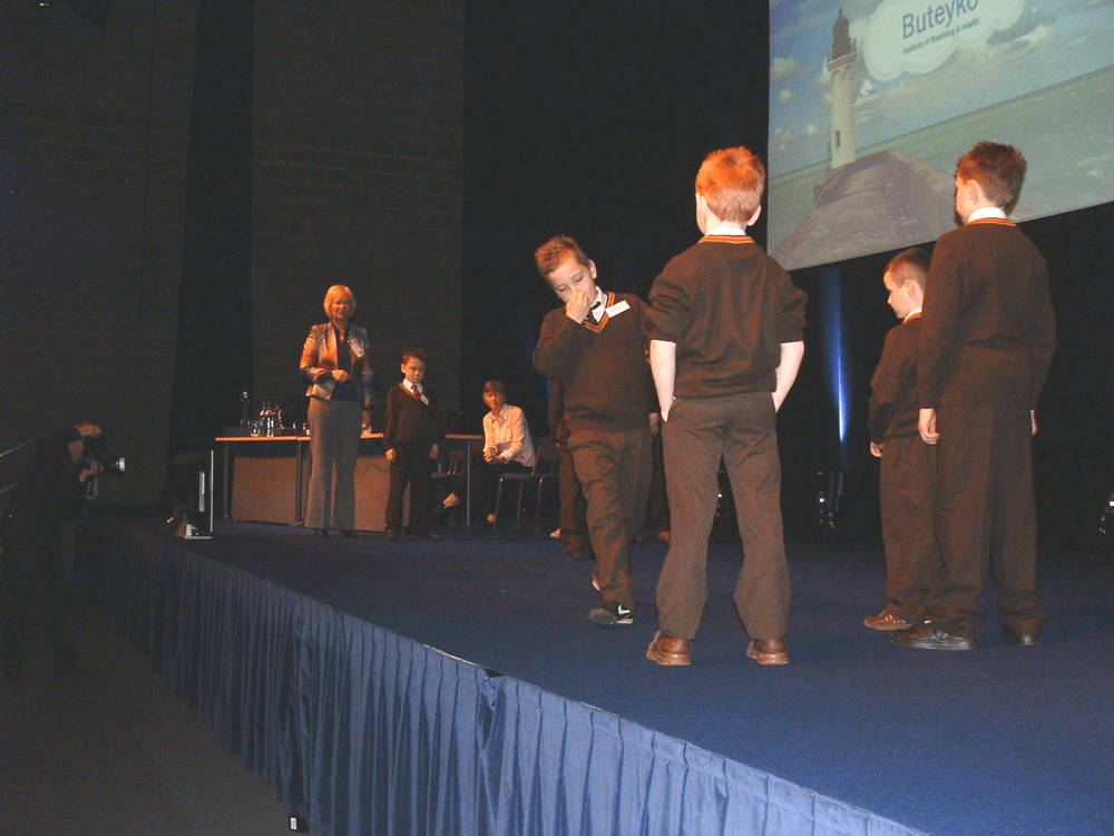School children demonstrating Buteyko breathing exercises