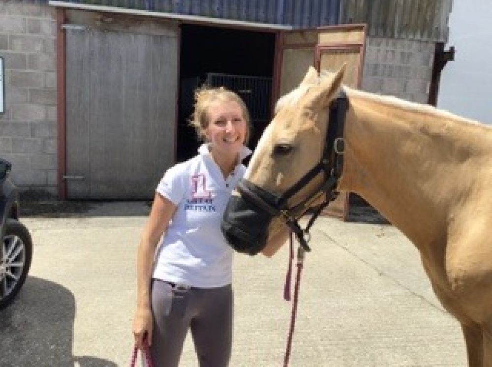 Happy owner with her horse wearing an All Weather Breather