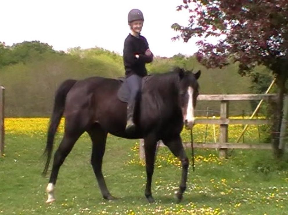 Riding figure 8s at liberty, arms folded